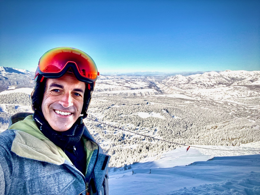 Snowboarding a summit